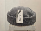 COPPOLA BARTS MONZONITE CAP CON PARAORECCHIE COLOR GRIGIO