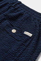 ANERKJENDT BERMUDA COLORE NAVY IN SEERSUCKER VESTIBILITA’ COMODA CON ELASTICO E LACCI IN VITA